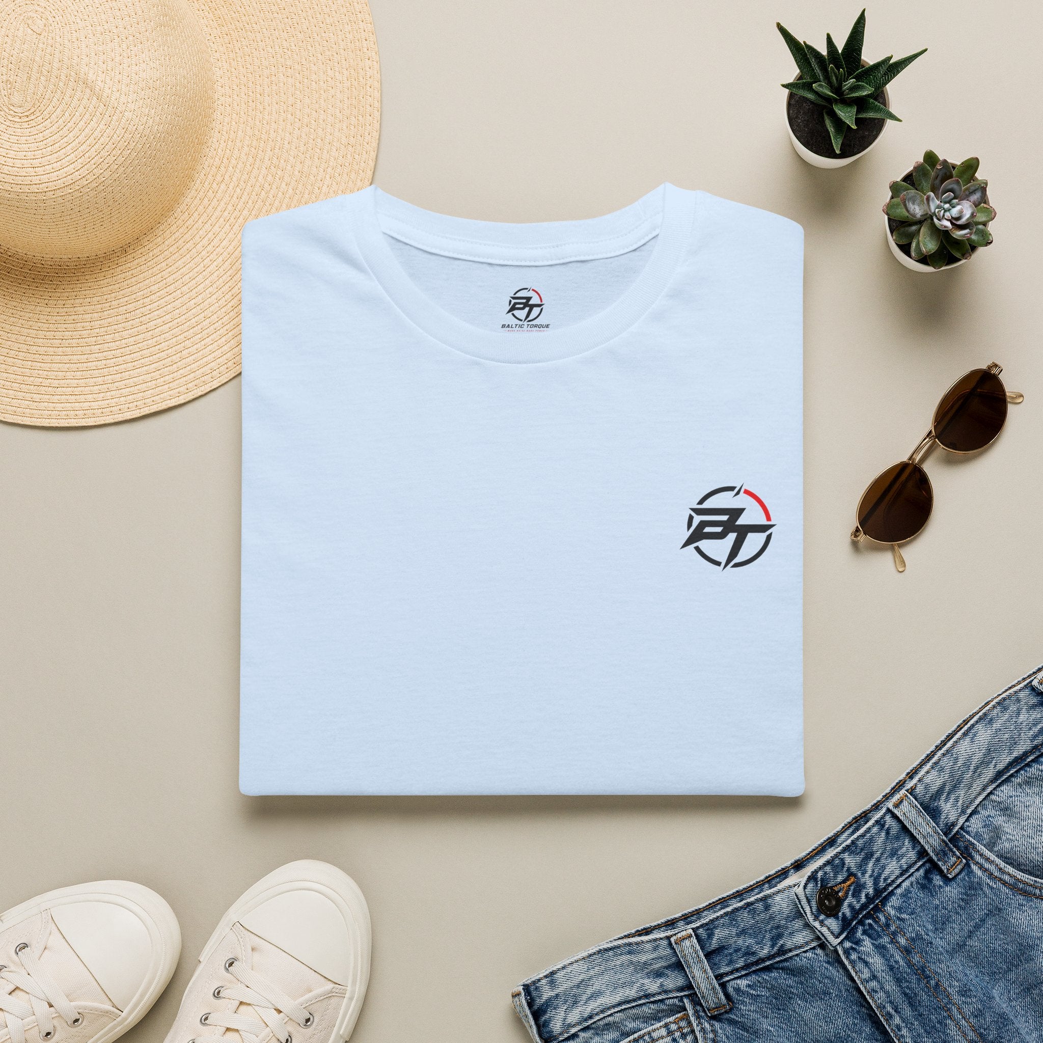 Minimalist Compass Logo T-Shirt — Small Chest Badge Graphic